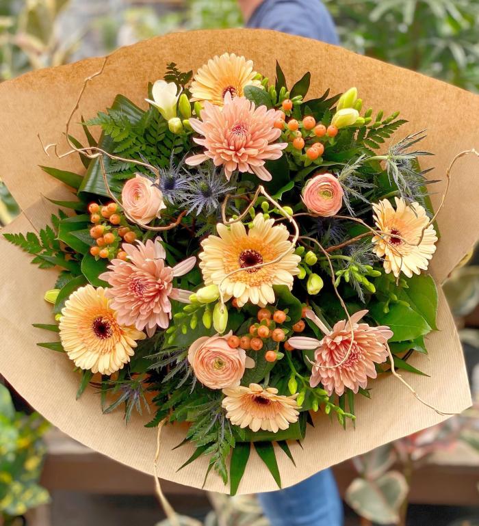 The Watering Can | Stunning large peach coloured hand-tied bouquet.